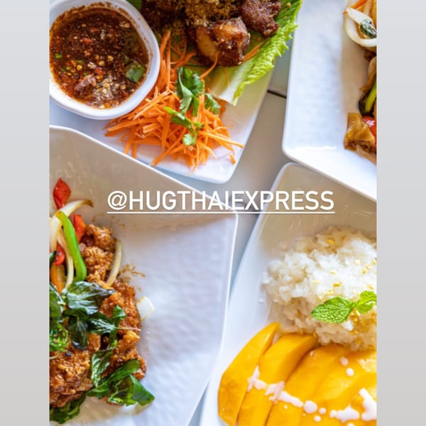A top-down view of four plates of Thai food, including mango sticky rice and a meat dish.